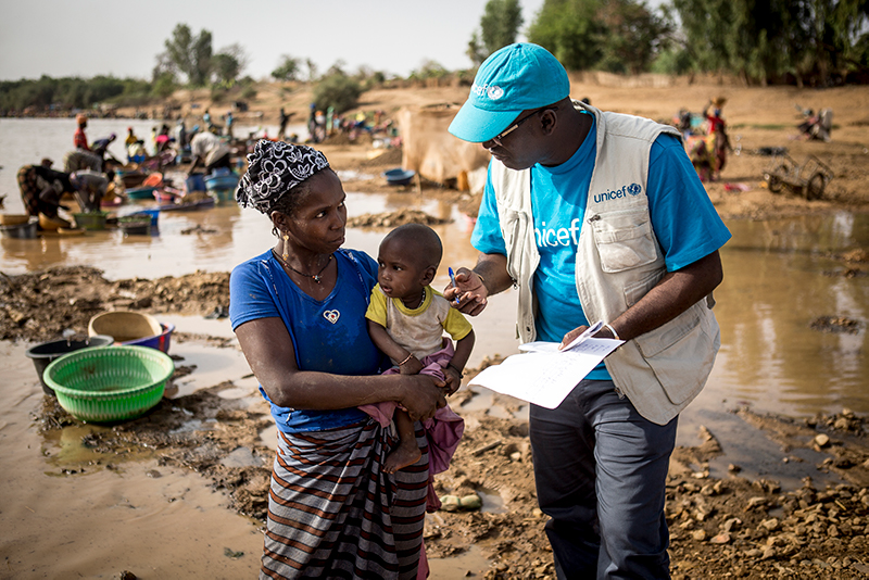 Adama Traore, vaccinating children in Mali