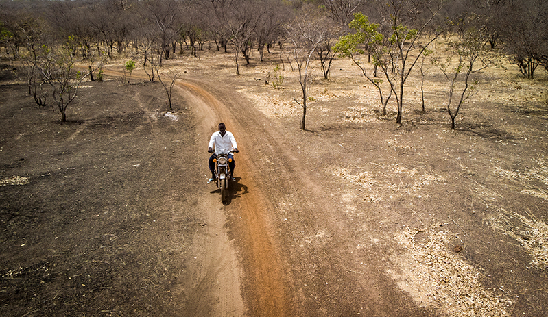 Adama Traore, using a bike to vaccinate children in Mali